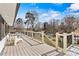 Lovely deck with lake view, featuring composite decking, and black aluminum railings at 156 Hazelton Loop, Mooresville, NC 28117