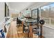 Bright and spacious home office with hardwood floors, multiple windows, and ample desk space, ideal for productivity at 156 Hazelton Loop, Mooresville, NC 28117