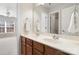 Bathroom featuring a double vanity, and a view into a bedroom with a ceiling fan at 2000 Willowcrest Dr, Waxhaw, NC 28173