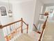 Bright foyer with a staircase, light fixture, hardwood floors, and a welcoming entrance at 2000 Willowcrest Dr, Waxhaw, NC 28173