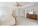 Another view of the spacious main bedroom, showing the closet, bathroom, and furniture at 2000 Willowcrest Dr, Waxhaw, NC 28173