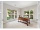 Home office with natural light and a classic desk creates a perfect workspace for working at home at 2000 Willowcrest Dr, Waxhaw, NC 28173