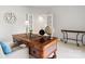 Executive home office featuring a classic desk, ambient lighting, and neutral tones for productive remote work at 2000 Willowcrest Dr, Waxhaw, NC 28173