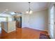 The dining room opens into the kitchen area and a door to a porch at 2007 Wexford Way, Statesville, NC 28625