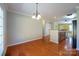 A dining room with a view into the kitchen area at 2007 Wexford Way, Statesville, NC 28625