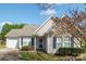 Inviting single-story home with a driveway, well-kept lawn, and attractive landscaping at 2007 Wexford Way, Statesville, NC 28625