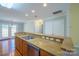 Bright kitchen featuring stainless steel appliances, ample counter space, and easy access to the dining area at 2007 Wexford Way, Statesville, NC 28625