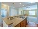 Modern kitchen with stainless steel appliances, a breakfast bar, and seamless access to the living area at 2007 Wexford Way, Statesville, NC 28625