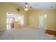 Open-concept living area with neutral walls, connecting to the kitchen and hallway at 2007 Wexford Way, Statesville, NC 28625