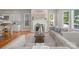 Inviting living room with fireplace, neutral colors and hardwood floors at 21013 Island Forest Dr, Cornelius, NC 28031