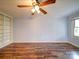 Bright living room featuring wood-look floors and built-in bookcases at 211 9Th St, Belmont, NC 28012