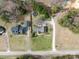 This aerial view highlights the property's layout, including homes, driveways, and mature trees at 2200 Peninsula Ave, Shelby, NC 28150