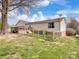 Large backyard featuring a fenced area and deck, offering plenty of space for outdoor activities at 2200 Peninsula Ave, Shelby, NC 28150