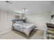 A simple bedroom featuring neutral carpeting, a full sized bed, and natural light from a window at 2200 Peninsula Ave, Shelby, NC 28150