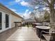 Outdoor deck area with fire pit and patio furniture, perfect for relaxation and entertaining at 2200 Peninsula Ave, Shelby, NC 28150