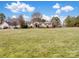Traditional home with a manicured lawn and mature trees, offers privacy and curb appeal at 2200 Peninsula Ave, Shelby, NC 28150