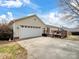 Attached two-car garage with additional backyard deck, offering convenient parking and outdoor space at 2200 Peninsula Ave, Shelby, NC 28150