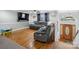 Cozy living room with hardwood floors, plush seating, and plenty of natural light at 2200 Peninsula Ave, Shelby, NC 28150