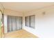 Covered back porch featuring wooden flooring, siding, and a sliding glass door at 288 John L Hudson Sr Rd, Lancaster, SC 29720