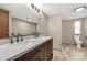 Modern bathroom featuring double sinks, a large mirror, and stylish fixtures at 288 John L Hudson Sr Rd, Lancaster, SC 29720
