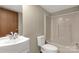 Bathroom featuring a single sink, a toilet, and a shower-tub combo at 288 John L Hudson Sr Rd, Lancaster, SC 29720