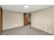 An empty bedroom featuring neutral walls, plush carpeting, and bright overhead lighting at 288 John L Hudson Sr Rd, Lancaster, SC 29720