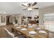 Digitally staged dining room featuring a large dining table and an open floor plan at 288 John L Hudson Sr Rd, Lancaster, SC 29720