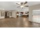 Open-concept living room with hardwood floors leading to kitchen and dining area at 288 John L Hudson Sr Rd, Lancaster, SC 29720