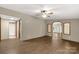 Bright living room with wood floors, ceiling fan and open view to other rooms at 288 John L Hudson Sr Rd, Lancaster, SC 29720