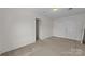 Bedroom with carpet, large closet and one window at 303 Cupped Oak Ct, Charlotte, NC 28213