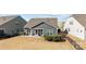 Overhead view of the well-kept backyard, featuring the porch and manicured landscaping at 305 Kentmere Ln, Clover, SC 29710