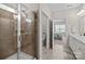 Spacious bathroom featuring a glass-enclosed shower and updated fixtures with a view into bedroom at 305 Kentmere Ln, Clover, SC 29710