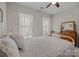 Bright bedroom with lots of natural light features a vintage dresser and cozy atmosphere at 305 Kentmere Ln, Clover, SC 29710