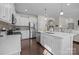 Bright kitchen features an island with bar stool seating at 305 Kentmere Ln, Clover, SC 29710