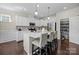 Bright kitchen featuring an island with bar seating, and stainless steel appliances at 305 Kentmere Ln, Clover, SC 29710