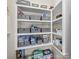 Organized pantry with shelving containing lots of supplies at 305 Kentmere Ln, Clover, SC 29710