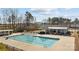 Beautiful swimming pool with clear water and a covered pavilion area, surrounded by trees in a well-maintained neighborhood at 305 Kentmere Ln, Clover, SC 29710