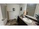 Bathroom with a combination shower and tub, a large mirror, and decorative accents at 312 Sailwinds Rd, Mooresville, NC 28115