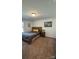 Bedroom with a comfortable bed, a matching nightstand, and natural light from the window at 312 Sailwinds Rd, Mooresville, NC 28115