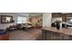 Living room with a comfortable sofa, hardwood floors, and an open layout connected to kitchen at 312 Sailwinds Rd, Mooresville, NC 28115