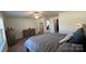 Bedroom with a hardwood dresser and an inviting view at 312 Sailwinds Rd, Mooresville, NC 28115