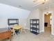 Unfinished attic featuring neutral paint, dormer window, and ceiling fan with light at 3199 Harmony Rd, Catawba, SC 29704