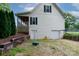 Exterior shot of the backyard including a fenced in yard and a walk out basement at 3199 Harmony Rd, Catawba, SC 29704