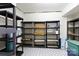 Organized basement storage area with shelves and ample room for storing belongings with patterned flooring at 3199 Harmony Rd, Catawba, SC 29704
