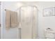 Bathroom featuring stand up shower, toilet and towel rack; all in clean white setting at 3199 Harmony Rd, Catawba, SC 29704
