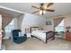 Bright bedroom with neutral paint, dormer window and ceiling fan with light at 3199 Harmony Rd, Catawba, SC 29704