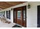 A charming front door with glass inserts and decorative lighting at 3199 Harmony Rd, Catawba, SC 29704
