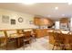 Eat-in kitchen with a breakfast bar and stainless steel appliances and wood cabinetry at 3199 Harmony Rd, Catawba, SC 29704