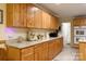 The well-equipped kitchen features granite countertops, and ample cabinet space at 3199 Harmony Rd, Catawba, SC 29704