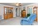 Inviting living room with a display cabinet, window, and comfortable armchair at 3199 Harmony Rd, Catawba, SC 29704